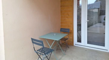 Coin terrasse à l'extérieur de la maison